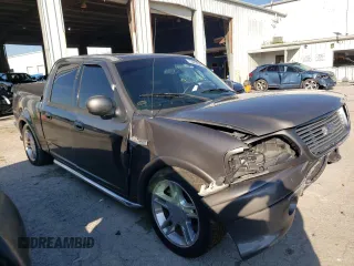 2002 Ford F-150 Harley Davidson with VIN 1FTRW07392KD46352, listed as a Copart auction lot 73463924 with 135,813 mi miles and Salvage Title. Bid and sale history available at carsss.com. Image 4.