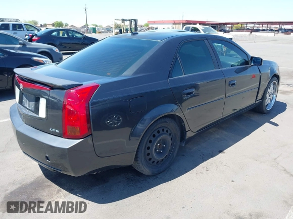 2005 Cadillac CTS with VIN 1G6DP567650227203, listed as a IAAI auction lot 42011203 with 151,683 mi miles. Bid and sale history available at carsss.com. Image 4.
