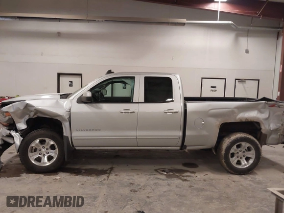 2019 Chevrolet Silverado 1500 LT with VIN 2GCVKPEC1K1212411, listed as a IAAI auction lot 41060633 with 75,508 mi miles and . Bid and sale history available at DreamBid. Image 14.