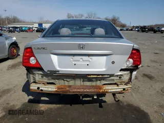 2004 Honda Civic LX with VIN 1HGEM22554L004730, listed as a Copart auction lot 48778575 with 253,548 mi miles and Salvage Title. Bid and sale history available at DreamBid. Image 6.