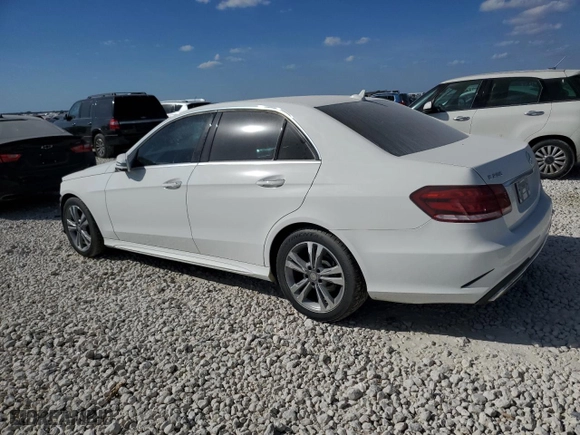 2015 Mercedes-Benz E-Class E 250 BlueTEC Luxury with VIN WDDHF0EB8FB157452, listed as a Copart auction lot 74910084 with 121,993 mi miles and Salvage Title. Bid and sale history available at carsss.com. Image 2.
