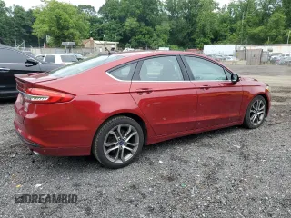 2017 Ford Fusion SE with VIN 3FA6P0H74HR197800, listed as a Copart auction lot 61042735 with 128,125 mi miles and Salvage title. Bid and sale history available at DreamBid. Image 3.