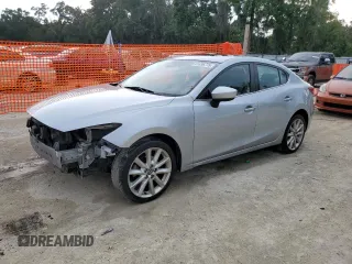 2017 Mazda 3 Touring с VIN 3MZBN1V77HM120387, выставлен на аукционе Copart как лот 61496775 с пробегом 95 432 миль миль и Списание • Salvage title. История ставок и продаж доступна на DreamBid. Изображение 1.
