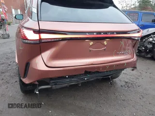 2023 Lexus RX 350h with VIN 2T2BBMCAXPC018936, listed as a IAAI auction lot 41027968 with 20,669 mi miles and . Bid and sale history available at DreamBid. Image 6.