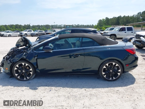2018 Buick Cascada Sport Touring z VIN W04WJ3N5XJG085431, wystawiony jako IAAI lot #42129756 z przebiegiem 24 364 mil mil oraz . Historia ofert i sprzedaży dostępna na DreamBid. Obrazek 14.