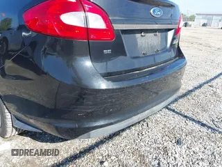 2011 Ford Fiesta SE with VIN 3FADP4BJ4BM144991, listed as a IAAI auction lot 42202406 with 67,448 mi miles and . Bid and sale history available at carsss.com. Image 6.
