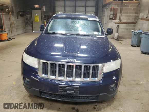 2013 Jeep Grand Cherokee Laredo with VIN 1C4RJFAG4DC502968, listed as a Copart auction lot 45549735 with 202,667 mi miles and Salvage Title. Bid and sale history available at carsss.com. Image 5.