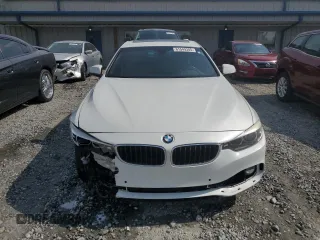 2018 BMW 4 Series 430i with VIN WBA4J1C57JBM10907, listed as a Copart auction lot 61549305 with 122,078 mi miles and Salvage title. Bid and sale history available at DreamBid. Image 5.
