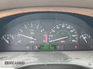 2002 Jaguar S-Type with VIN SAJDA01P12GM27242, listed as a Copart auction lot 88579215 with 218,546 mi miles and Salvage Title. Bid and sale history available at DreamBid. Image 9.