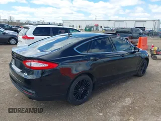 2014 Ford Fusion SE with VIN 3FA6P0HD1ER373400, listed as a IAAI auction lot 42046660 with 191,621 mi miles and . Bid and sale history available at DreamBid. Image 4.