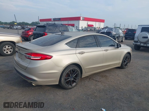 2018 Ford Fusion SE z VIN 3FA6P0HD6JR279927, wystawiony jako IAAI lot #42430172 z przebiegiem 145 080 mil mil oraz . Historia ofert i sprzedaży dostępna na DreamBid. Obrazek 4.