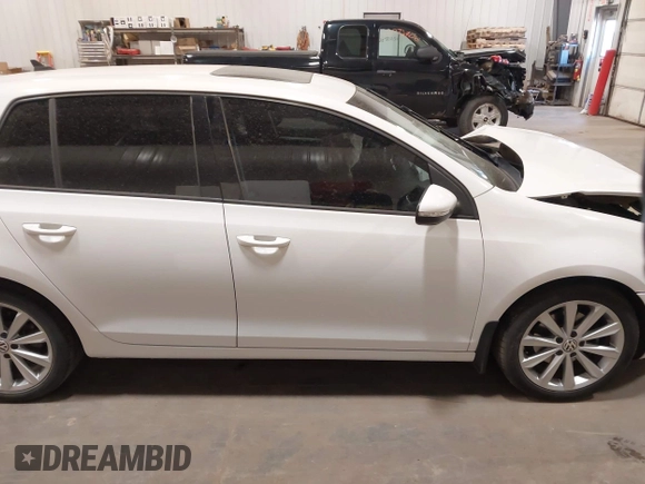 2012 Volkswagen Golf TDI z VIN WVWDM7AJ9CW296921, wystawiony jako IAAI lot #42070028 z przebiegiem 113 511 mil mil oraz . Historia ofert i sprzedaży dostępna na DreamBid. Obrazek 14.