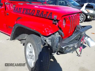 2022 Jeep Gladiator Willys Sport z VIN 1C6HJTAG0NL180848, wystawiony jako IAAI lot #41778129 z przebiegiem Nie podano mil oraz . Historia ofert i sprzedaży dostępna na DreamBid. Obrazek 21.