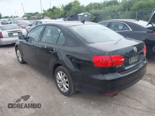 2011 Volkswagen Jetta SE with VIN 3VWDX7AJ7BM052493, listed as a IAAI auction lot 42745045 with 179,732 mi miles and . Bid and sale history available at DreamBid. Image 3.