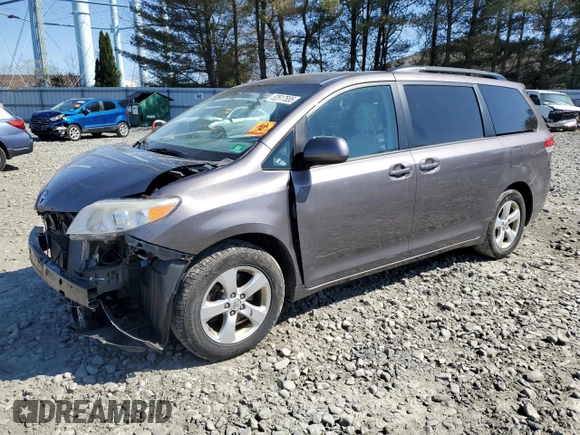 2014 Toyota Sienna LE AAS with VIN 5TDKK3DC6ES511466, listed as a Copart auction lot 52517555 with 142,744 mi miles and Salvage Title. Bid and sale history available at DreamBid. Image 1.