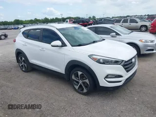 2016 Hyundai Tucson Limited with VIN KM8J33A21GU169553, listed as a IAAI auction lot 41989847 with 91,769 mi miles. Bid and sale history available at carsss.com. Image 1.