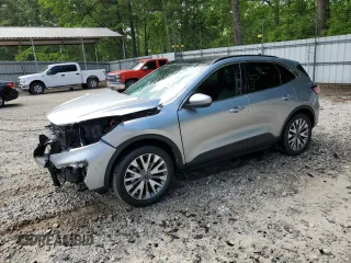 2022 Ford Escape Titanium Hybrid z VIN 1FMCU9DZ0NUA06522, wystawiony jako Copart lot #54598185 z przebiegiem 129 596 mil mil oraz Szkoda całkowita • Salvage title. Historia ofert i sprzedaży dostępna na DreamBid. Obrazek 1.