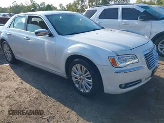 2012 Chrysler 300 Limited with VIN 2C3CCAHG3CH313690, listed as a IAAI auction lot 40238227 with 85,020 mi miles and . Bid and sale history available at DreamBid. Image 1.