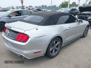 2015 Ford Mustang V6 with VIN 1FATP8EM5F5418946, listed as a IAAI auction lot 42375040 with 127,968 mi miles and . Bid and sale history available at DreamBid. Image 4.