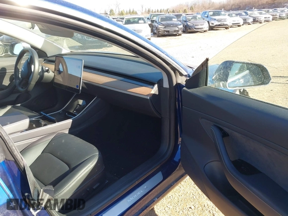 2018 Tesla Model 3 Long Range Battery with VIN 5YJ3E1EA0JF037736, listed as a IAAI auction lot 41423506 with 23,675 mi miles and . Bid and sale history available at DreamBid. Image 5.