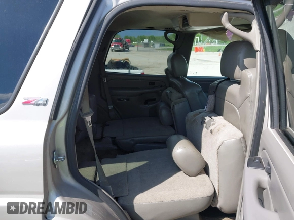 2005 Chevrolet Tahoe LT z VIN 1GNEK13T35R196103, wystawiony jako IAAI lot #42053184 z przebiegiem 326 536 mil mil oraz . Historia ofert i sprzedaży dostępna na DreamBid. Obrazek 8.
