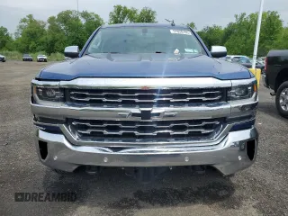 2017 Chevrolet Silverado 1500 LTZ with VIN 1GCVKSECXHZ364545, listed as a Copart auction lot 57020195 with 197,463 mi miles and Clean Title. Bid and sale history available at DreamBid. Image 5.