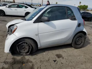 2016 Smart fortwo Passion z VIN WMEFJ5DA4GK141225, wystawiony jako Copart lot #48356965 z przebiegiem 65 928 mil mil oraz Szkody całkowita. Historia ofert i sprzedaży dostępna na DreamBid. Obrazek 1.