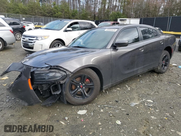 2021 Dodge Charger SXT with VIN 2C3CDXBG9MH541736, listed as a Copart auction lot 48955525 with 100,997 mi miles and Salvage Title. Bid and sale history available at carsss.com. Image 1.