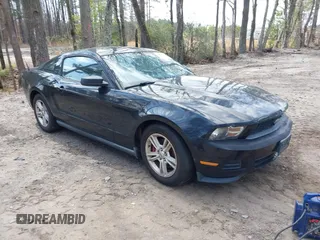 2012 Ford Mustang V6 Premium with VIN 1ZVBP8AM1C5205321, listed as a IAAI auction lot 41877052 with 120,412 mi miles. Bid and sale history available at carsss.com. Image 1.