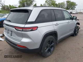 2023 Jeep Grand Cherokee Altitude with VIN 1C4RJHAG8PC611840, listed as a IAAI auction lot 42336992 with 41,100 mi miles and . Bid and sale history available at DreamBid. Image 4.