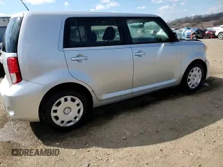 2012 Scion xB with VIN JTLZE4FE1CJ009084, listed as a Copart auction lot 50447785 with 74,155 mi miles and Salvage Title. Bid and sale history available at carsss.com. Image 14.