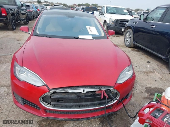 2013 Tesla Model S with VIN 5YJSA1CN9DFP09973, listed as a IAAI auction lot 41657188 with 61,546 mi miles. Bid and sale history available at carsss.com. Image 6.