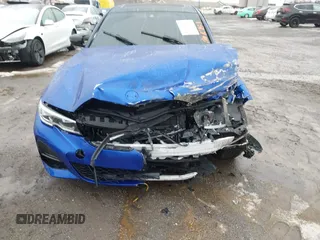 2022 BMW 3 Series 330i z VIN 3MW5R1J06N8C49056, wystawiony jako IAAI lot #41496252 z przebiegiem Nie podano mil oraz . Historia ofert i sprzedaży dostępna na DreamBid. Obrazek 6.