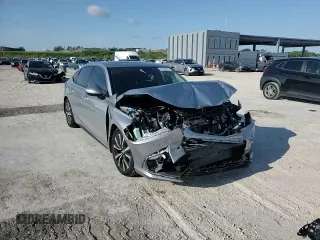 2024 Honda Civic EX-L z VIN 19XFL1H73RE004153, wystawiony jako Copart lot #56208225 z przebiegiem 23 962 mil mil oraz Szkoda całkowita • Salvage title. Historia ofert i sprzedaży dostępna na DreamBid. Obrazek 13.