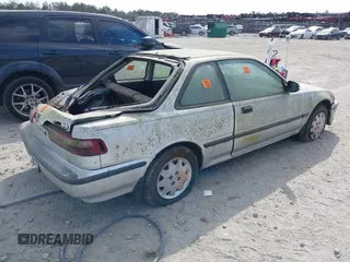 1990 Acura Integra z VIN JH4DA9440LS059914, wystawiony jako IAAI lot #41720214 z przebiegiem 147 590 mil mil oraz . Historia ofert i sprzedaży dostępna na DreamBid. Obrazek 4.