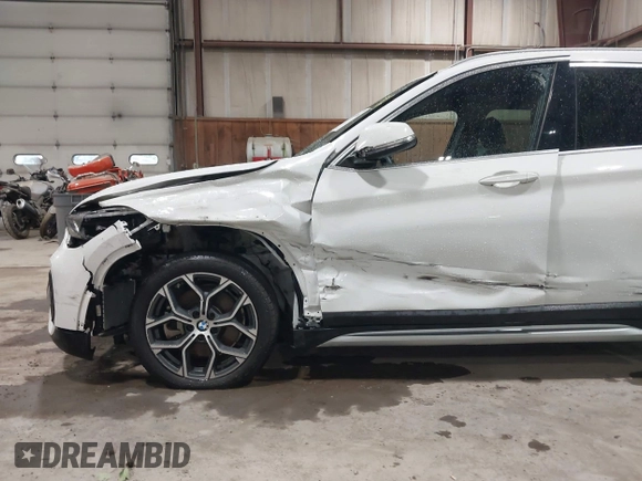 2021 BMW X1 xDrive28i with VIN WBXJG9C04M5T82884, listed as a IAAI auction lot 42242890 with 24,647 mi miles and . Bid and sale history available at DreamBid. Image 6.