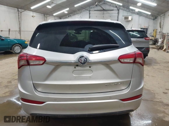 2019 Buick Envision Essence with VIN LRBFXCSA3KD119247, listed as a IAAI auction lot 42001735 with 51,566 mi miles and . Bid and sale history available at carsss.com. Image 16.