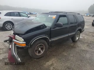1995 Chevrolet Blazer LS with VIN 1GNCS13W5S2165022, listed as a Copart auction lot 58006505 with 318,061 mi miles and Salvage title. Bid and sale history available at DreamBid. Image 1.