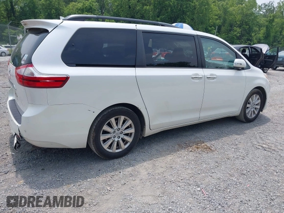 2015 Toyota Sienna XLE with VIN 5TDYK3DC3FS586329, listed as a IAAI auction lot 42496805 with 132,828 mi miles and . Bid and sale history available at DreamBid. Image 4.