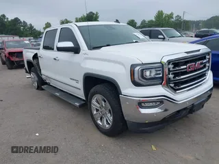 2018 GMC Sierra 1500 SLT with VIN 3GTU2NER1JG397313, listed as a IAAI auction lot 42570823 with 118,878 mi miles and . Bid and sale history available at DreamBid. Image 1.