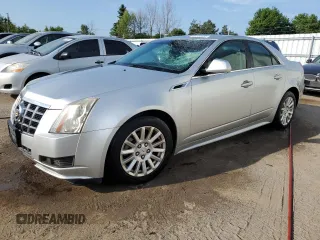 2012 Cadillac CTS with VIN 1G6DC5E56C0143293, listed as a Copart auction lot 63733405 with 244,318 mi miles and Salvage title. Bid and sale history available at DreamBid. Image 1.