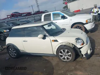 2007 MINI Hardtop with VIN WMWMF33587TT52466, listed as a IAAI auction lot 41964371 with 129,842 mi miles and . Bid and sale history available at DreamBid. Image 13.