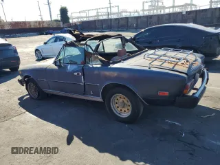 1979 FIAT 124 Spider z VIN 124C520160260, wystawiony jako Copart lot #77263224 z przebiegiem 68 917 mil mil oraz Czysty tytuł • Clean title. Historia ofert i sprzedaży dostępna na DreamBid. Obrazek 2.