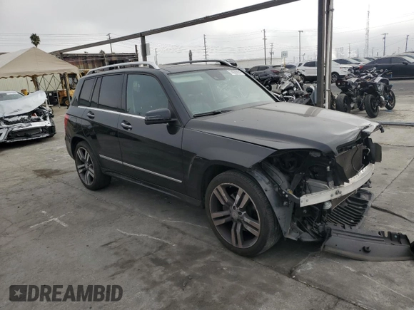 2015 Mercedes-Benz GLK 350 with VIN WDCGG5HB5FG427861, listed as a Copart auction lot 74520694 with 54,284 mi miles and Salvage Title. Bid and sale history available at DreamBid. Image 4.