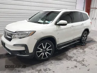 2019 Honda Pilot Touring 7-Passenger with VIN 5FNYF6H64KB005798, listed as a IAAI auction lot 41551933 with 103,151 mi miles. Bid and sale history available at carsss.com. Image 17.