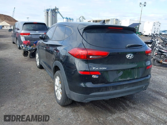 2019 Hyundai Tucson SE with VIN KM8J2CA46KU977863, listed as a IAAI auction lot 41704318 with 23,076 mi miles. Bid and sale history available at carsss.com. Image 3.