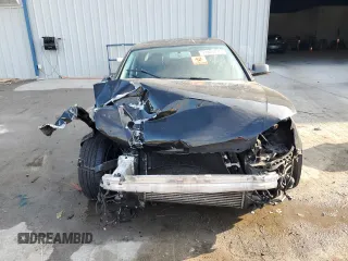 2011 Audi A4 Premium z VIN WAUAFAFL0BN010881, wystawiony jako Copart lot #53045775 z przebiegiem 151 603 mil mil oraz Szkoda całkowita • Salvage title. Historia ofert i sprzedaży dostępna na DreamBid. Obrazek 5.