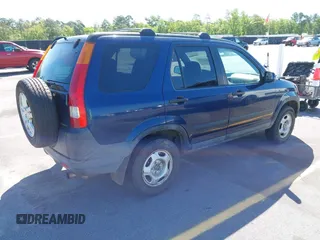 2004 Honda CR-V EX with VIN SHSRD78804U249543, listed as a IAAI auction lot 42040422 with 280,960 mi miles and . Bid and sale history available at carsss.com. Image 4.