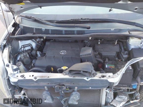 2011 Toyota Sienna SE with VIN 5TDXK3DC5BS062055, listed as a IAAI auction lot 42140951 with 141,539 mi miles and . Bid and sale history available at DreamBid. Image 10.