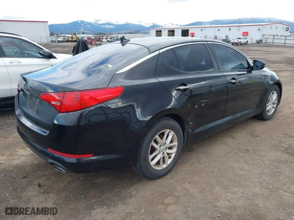 2012 Kia Optima LX with VIN KNAGM4A75C5297194, listed as a IAAI auction lot 41816301 with 119,064 mi miles. Bid and sale history available at carsss.com. Image 4.